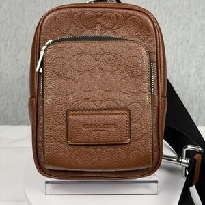Coach West Pack Signature Embossed Leather Sling Bag Vintage Brown CDC45